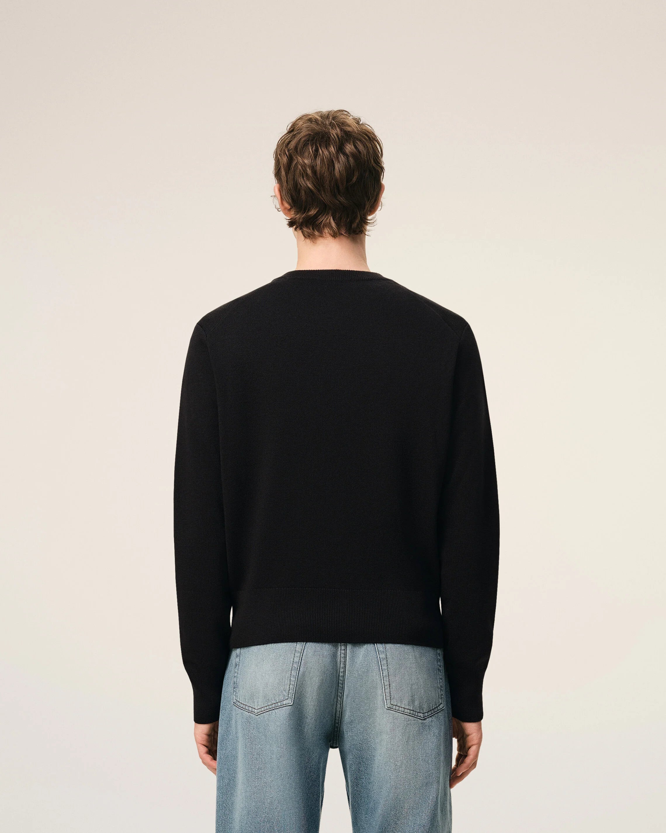 AMI Paris black merino cardigan with a ton on ton black logo on chest modell back