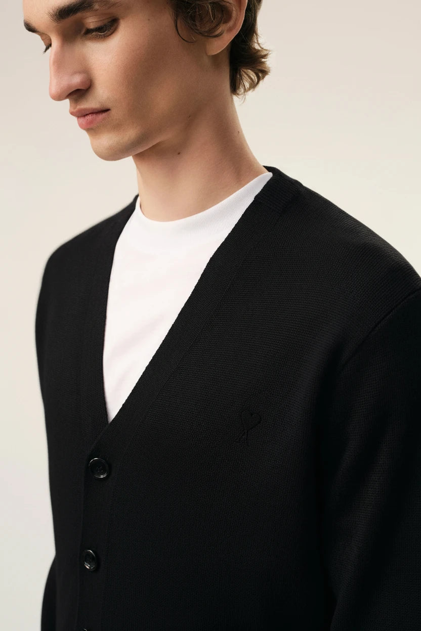AMI Paris black merino cardigan with a ton on ton black logo on chest model detail