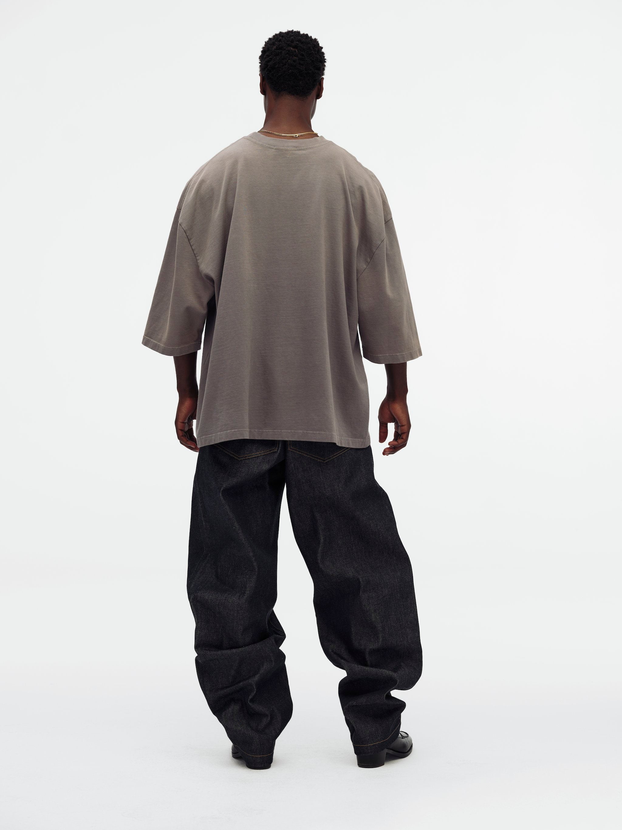 Willy Chavarria Grey Community Center Buffalo Tee model back